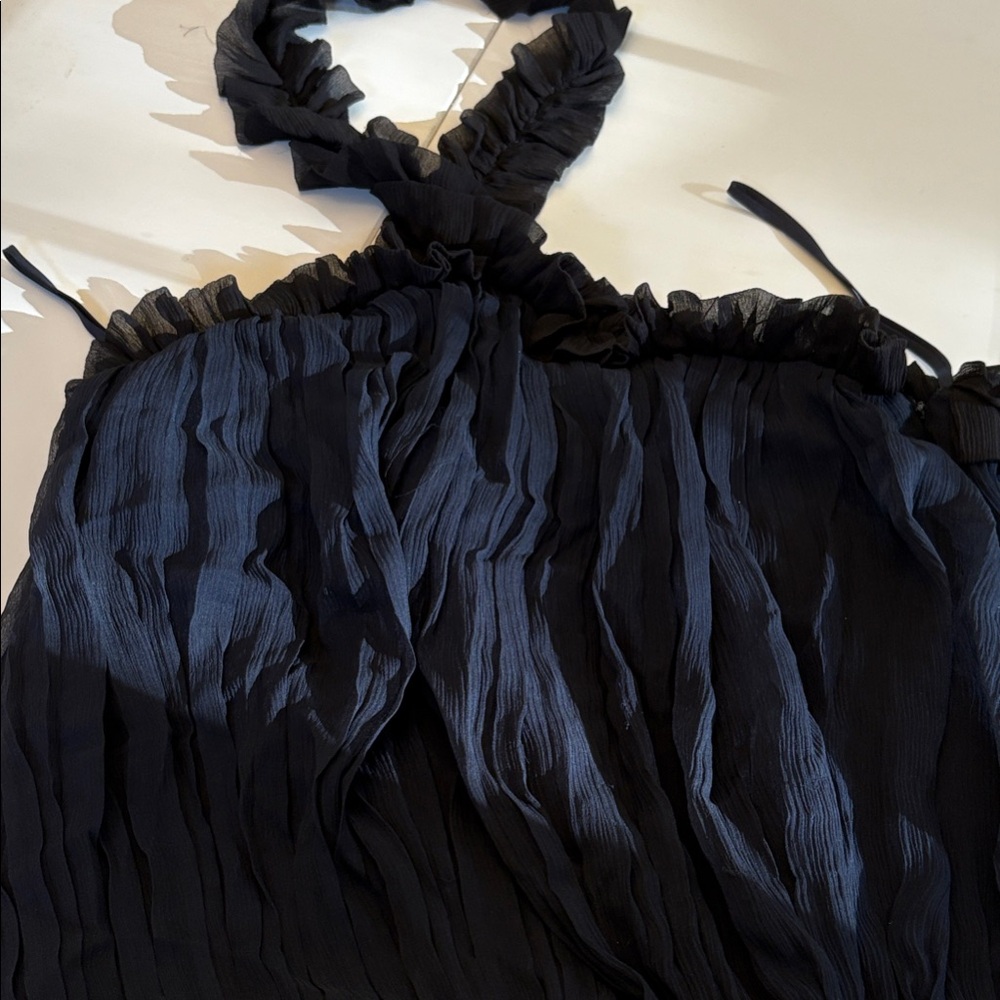 Elegant navy blue and black halter top, Intermix brand.